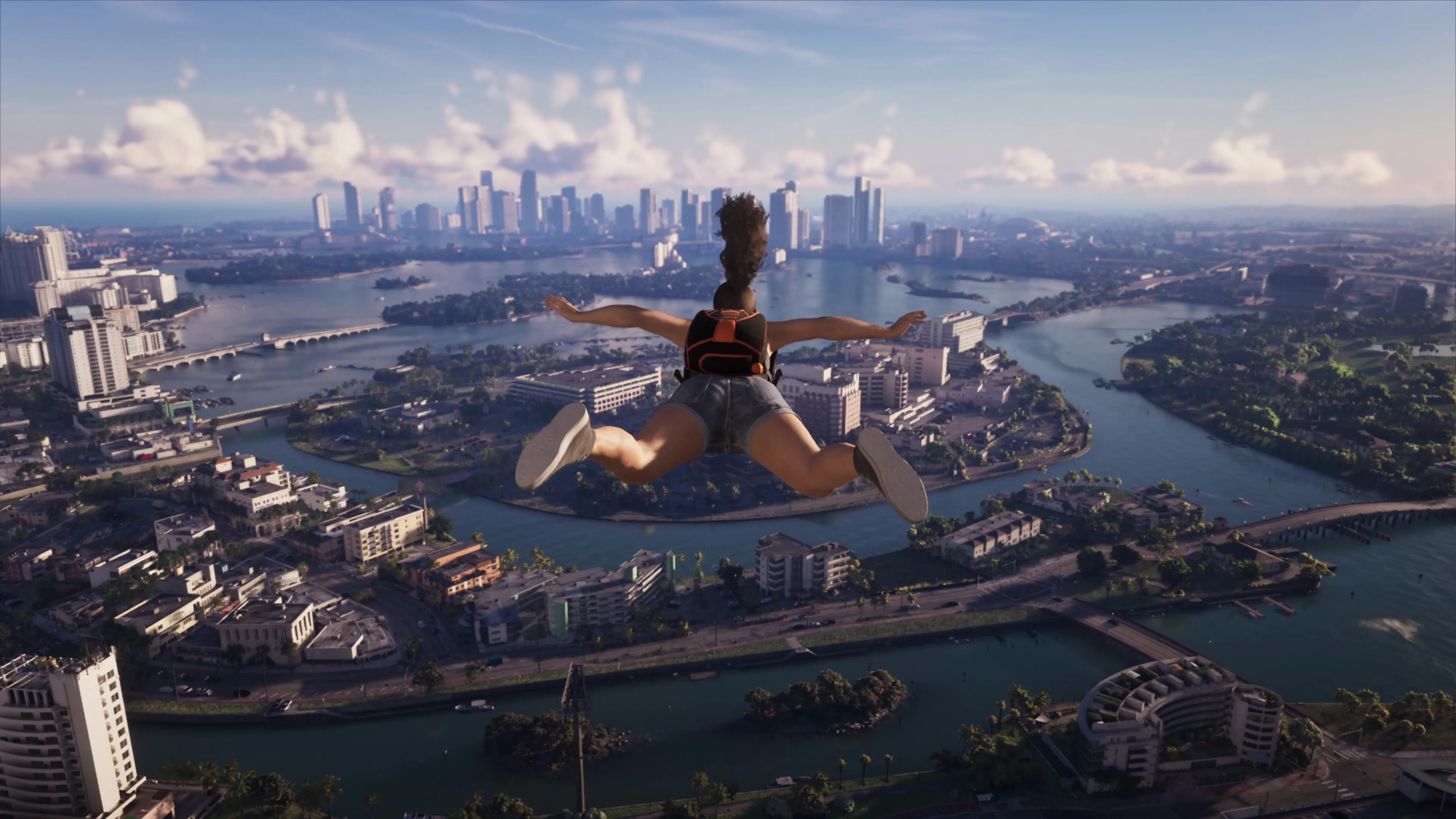 A base jump in free fall over the Vice City islands and skyline, from Grand Theft Auto VI: An Extended Look.