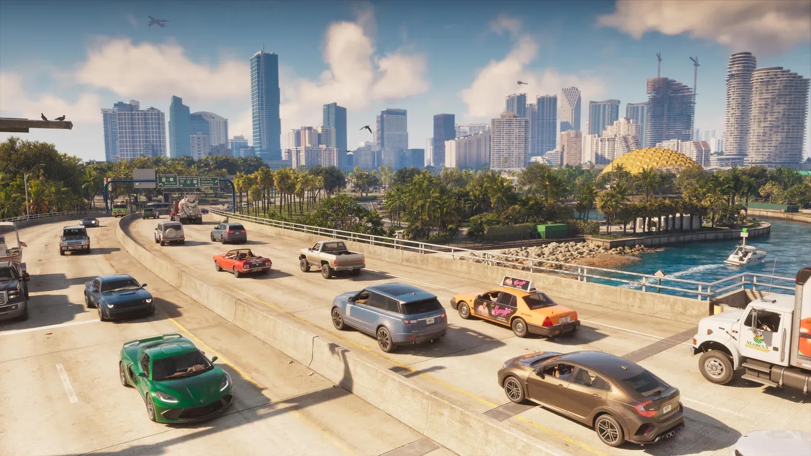 Visuel Rockstar pour la radio de GTA 6 : circulation sur une chaussée de Vice City devant les gratte-ciel du centre