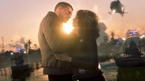 Jason and Lucia holding each other at sunset in the wetlands while sheriff airboats and a helicopter close in