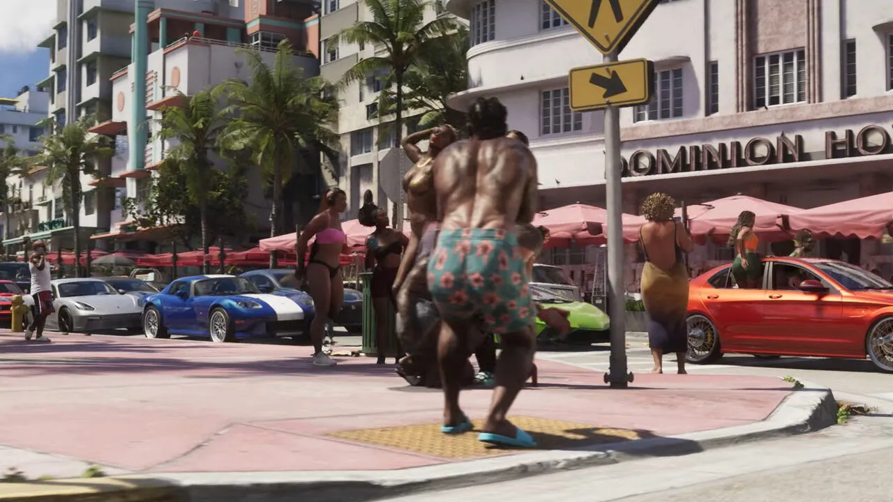 Official GTA VI Trailer 2 still of a Vice City intersection - the blue sports car is the Bravado Banshee, as identified by automotive press