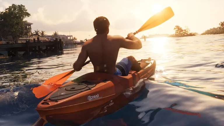 Jason paddelt in einem roten Crest-Kajak von einem Anleger in den Keys in die tiefe Sonne