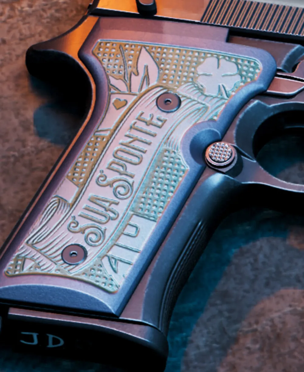 Close-up of the engraved grip on Jason's Girardi ES9 reading SUA SPONTE