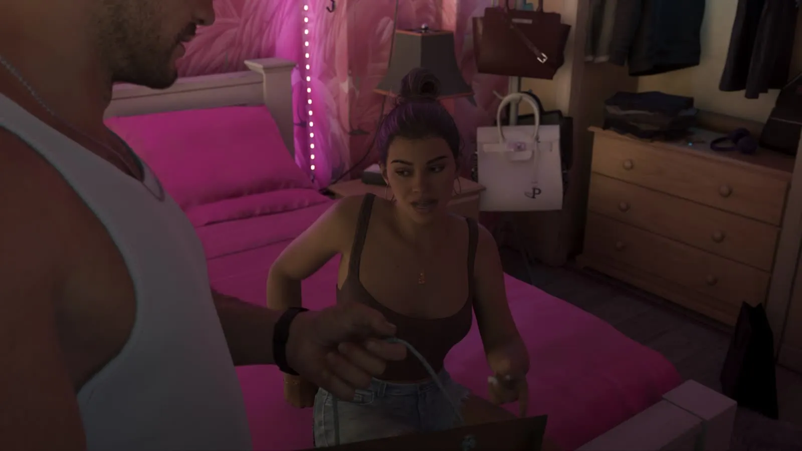 Lucia sitting on a pink bed in the shared apartment, from the GTA 6 Extended Look