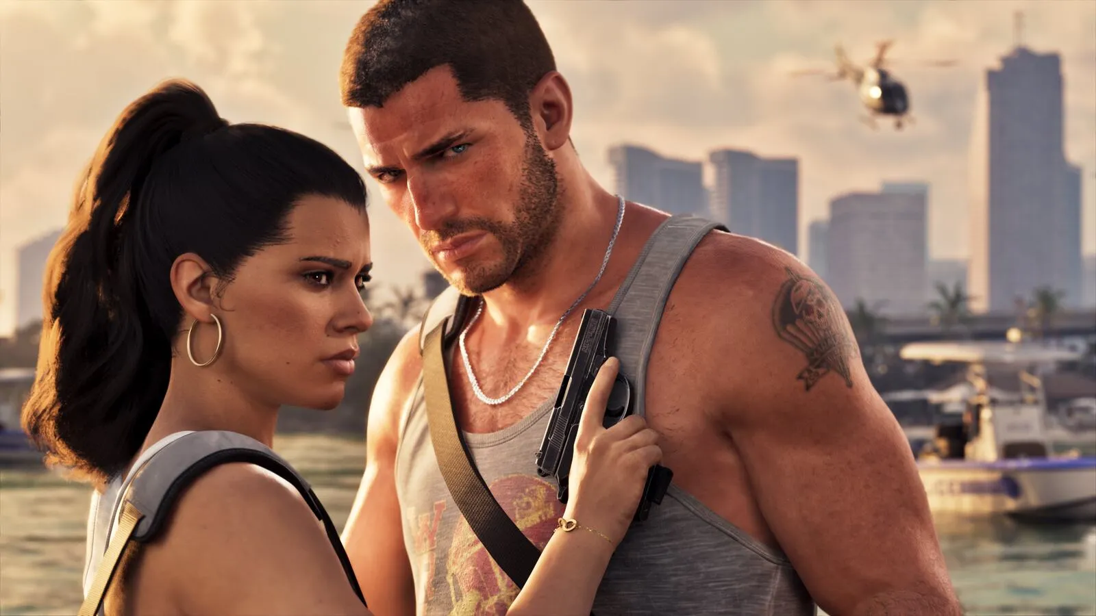 Jason and Lucia standing close together on the Vice City waterfront, police helicopters over the skyline behind them, from Rockstar's official Grand Theft Auto VI screenshot gallery.