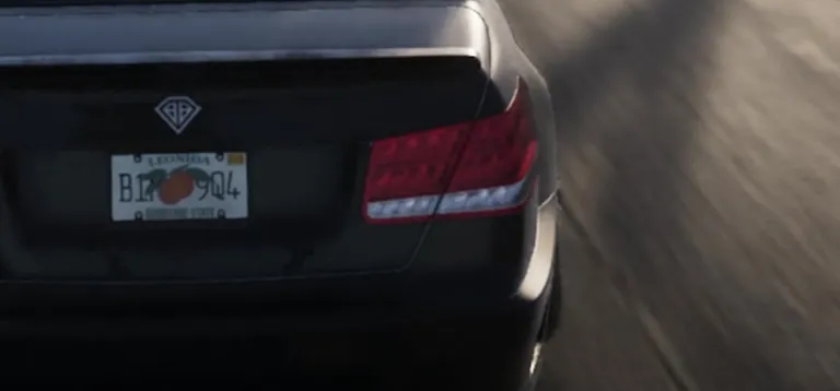 The Leonida number plate on a saloon, reading Leonida with an orange and Sunshine State, from Grand Theft Auto VI, An Extended Look