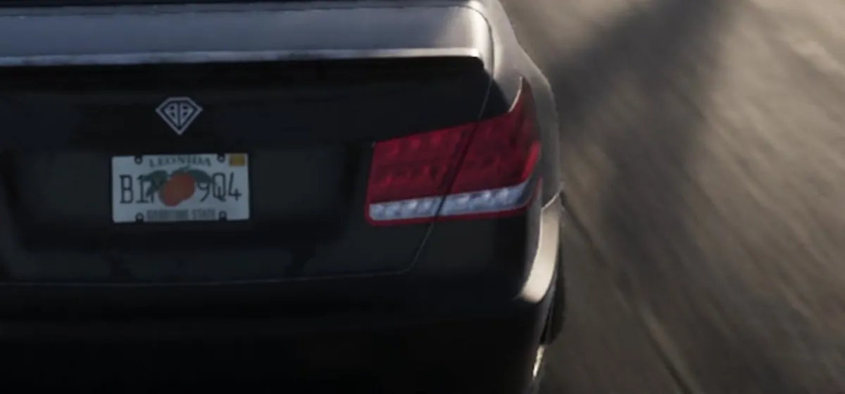 The Leonida number plate on a saloon, reading Leonida with an orange and Sunshine State, from Grand Theft Auto VI, An Extended Look