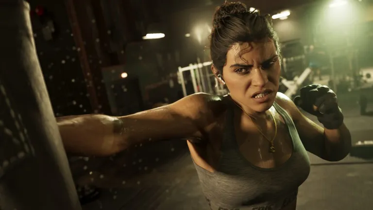 Lucia Caminos official artwork from the GTA VI website - Lucia punching a heavy bag in a gym