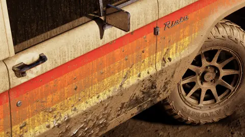 The Riata script badge on the front wing of the mud-covered pickup, official Rockstar render