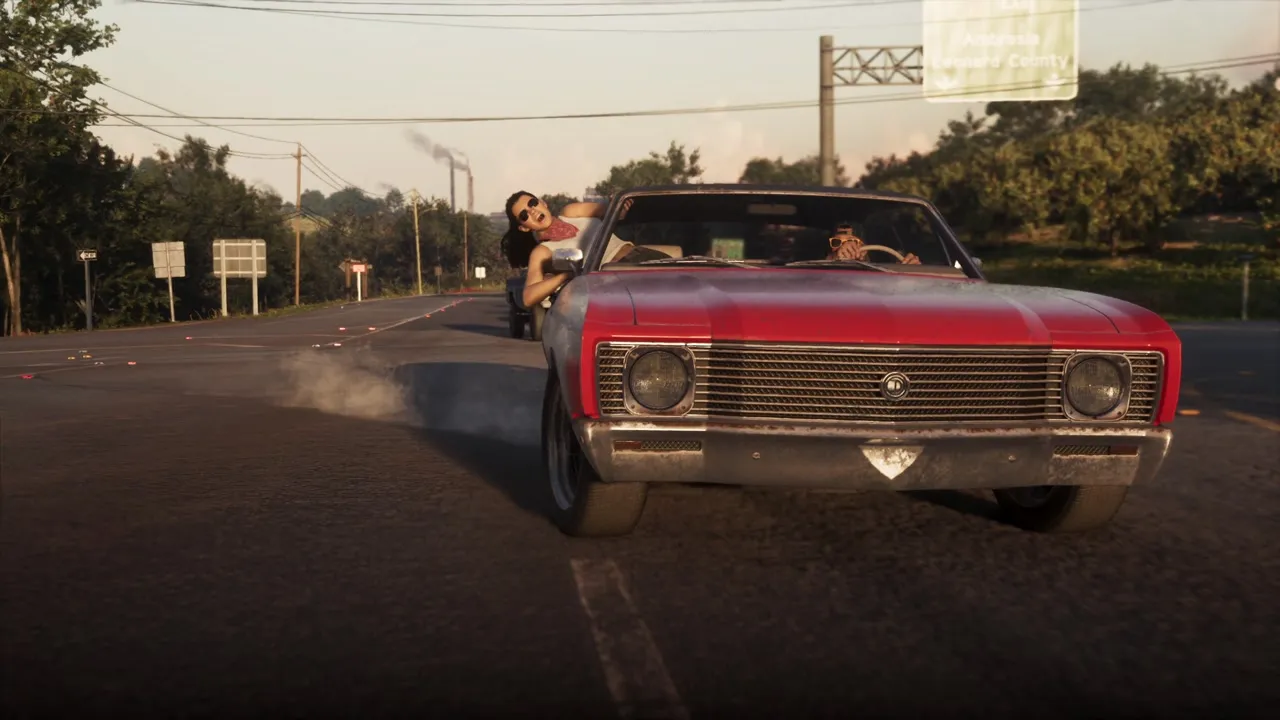 A red convertible on a Vice City road in daylight, from the GTA 6 Extended Look