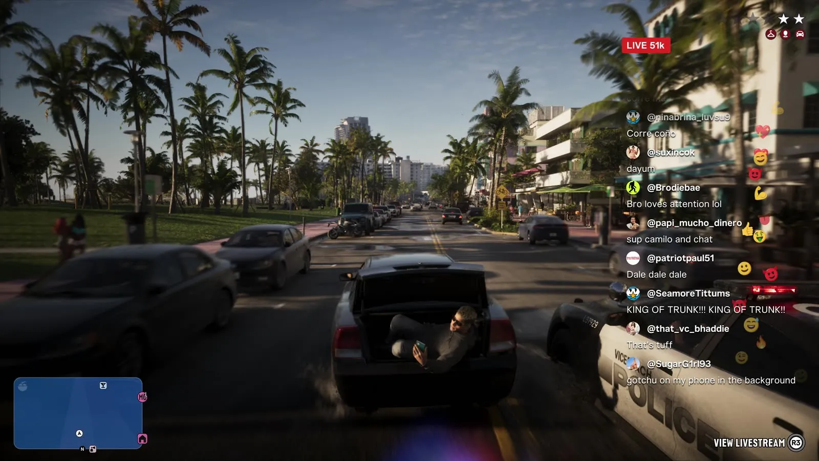 An in-game livestream overlay in Grand Theft Auto VI, a live viewer counter and scrolling chat over a police chase down a Vice City palm-lined street, from An Extended Look.