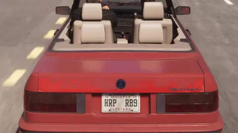 The SENTINEL badge and Übermacht roundel on the boot lid of the red convertible, from the GTA 6 Extended Look